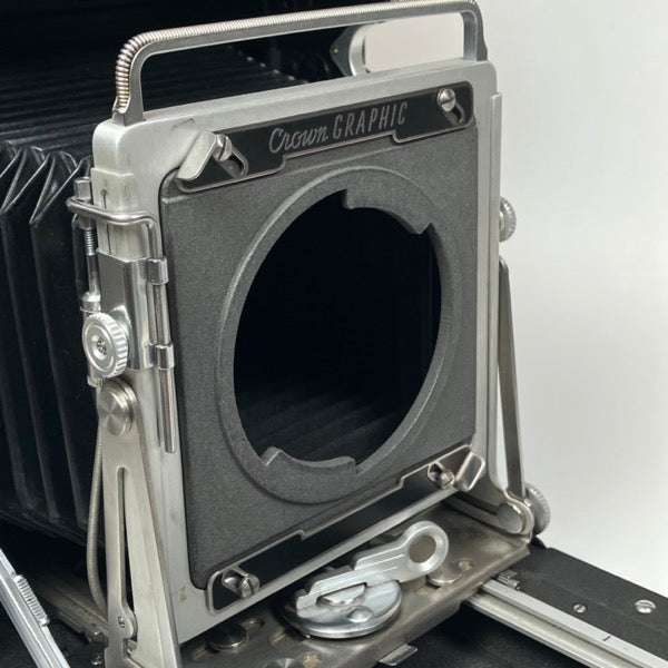 TWIST-LOCK LENS BOARD
